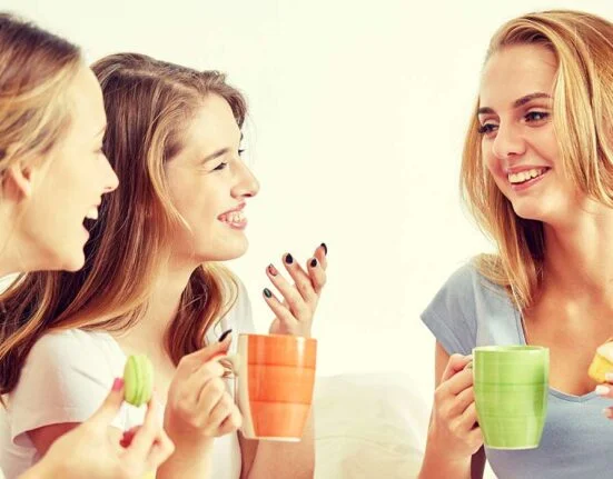 Three girls enjoying each other