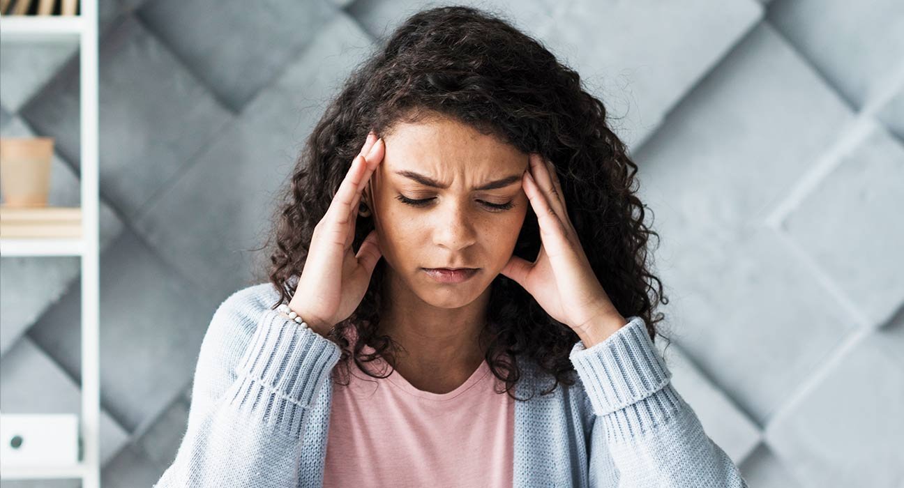 a lady disturbed with headache