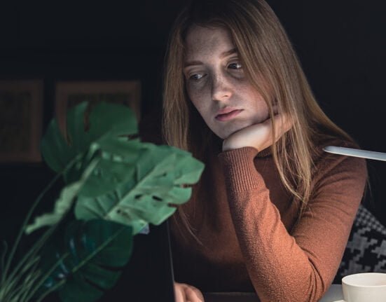 A girl sitting with bad mood