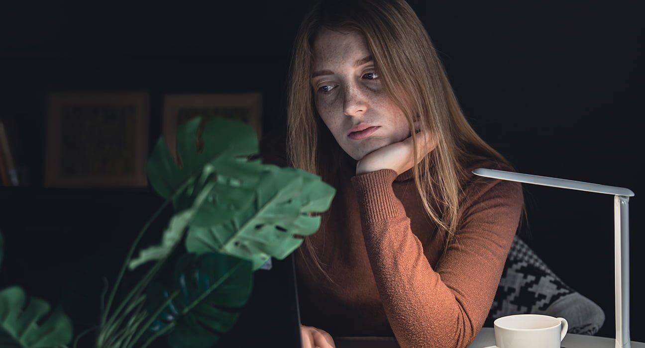 A girl sitting with bad mood