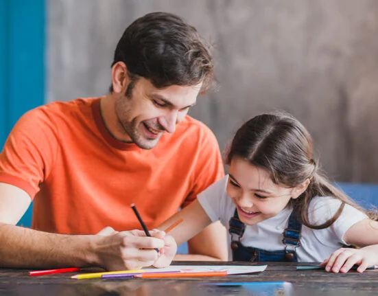 a girl learning the writing skills